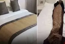 Por que os hotéis colocam uma faixa de tecido sobre a cama? Pouca gente conhece sua verdadeira utilidade